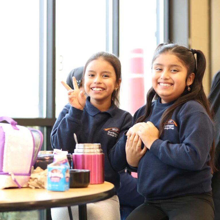 NECP Students Smiling at the Lunch Room